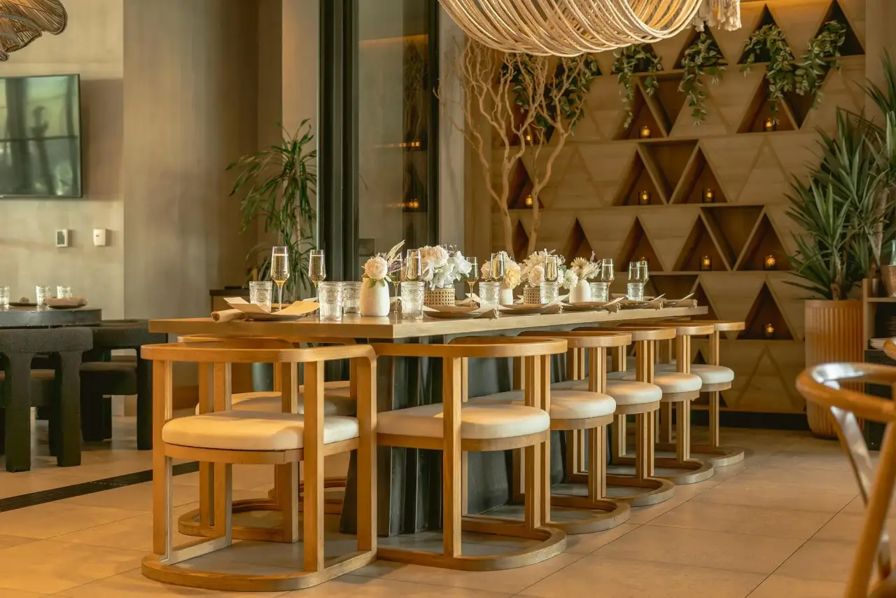 A long table set for an event at CALA