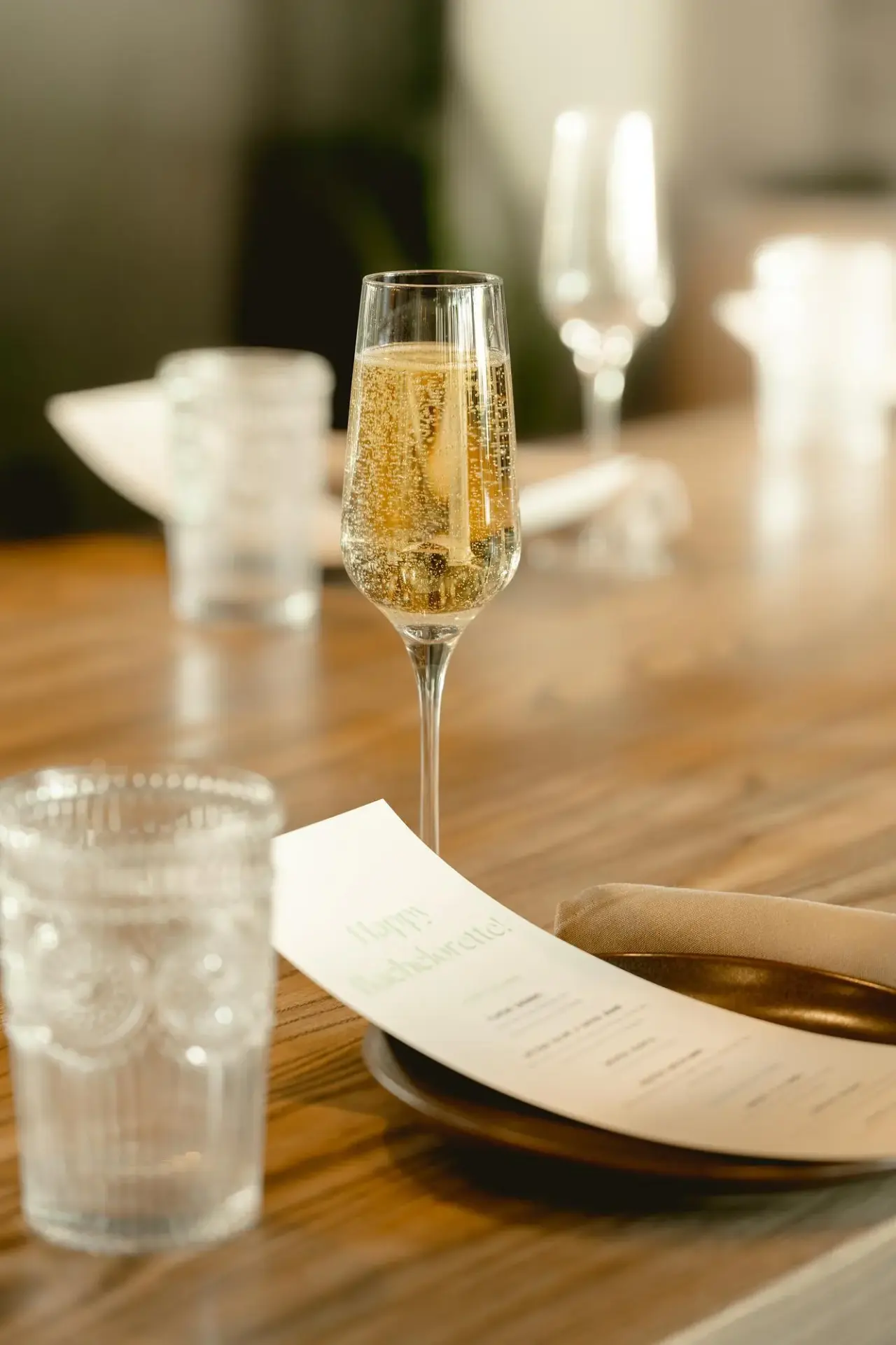 Champagne and a personalized menu for the guest of honor